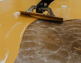 epoxy flooring being applied